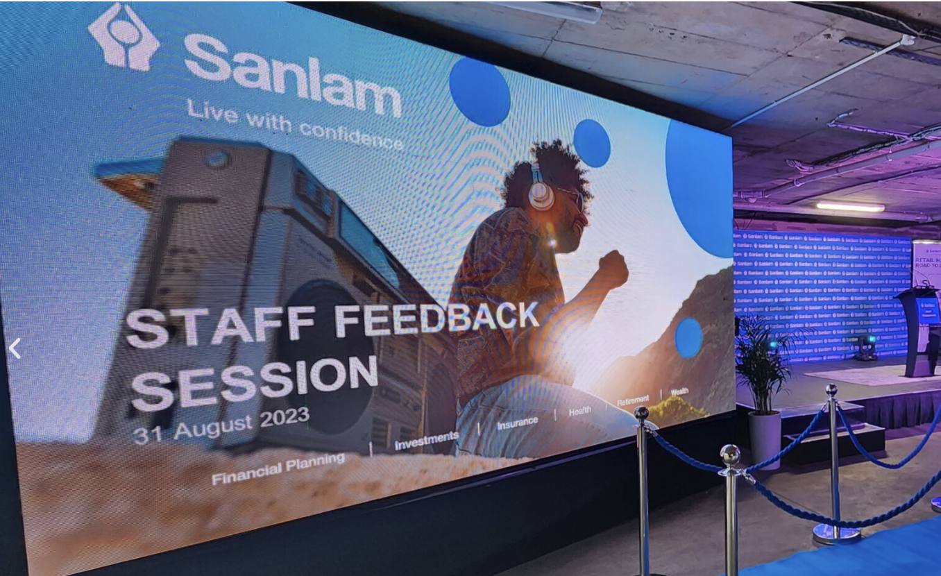 Large indoor LED wall at a corporate staff session
